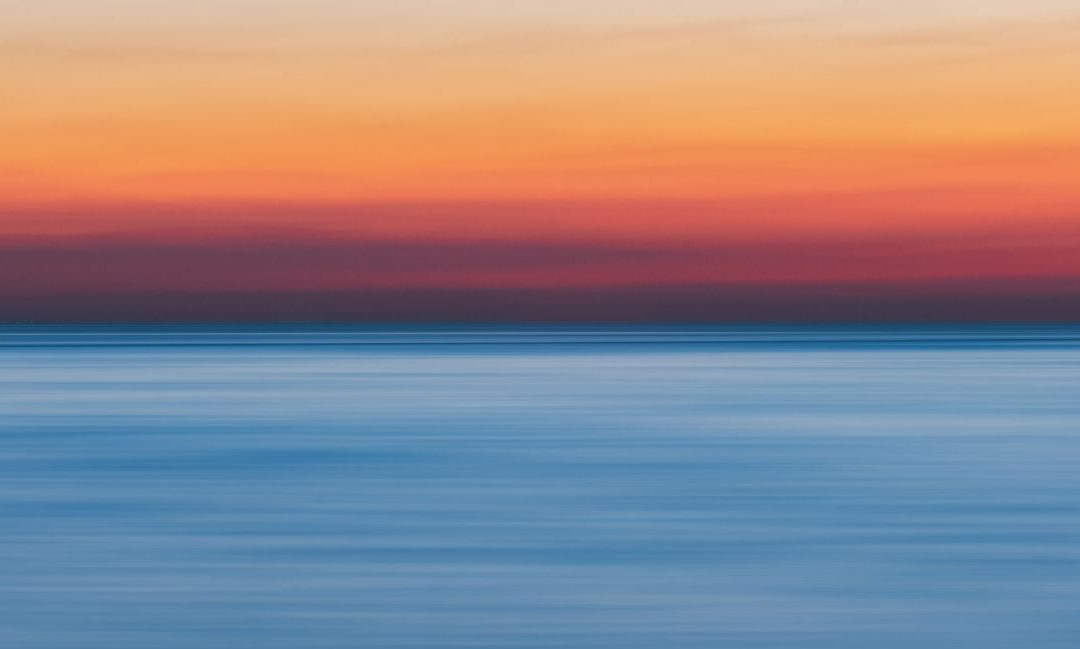Body Of Water During Golden Hour